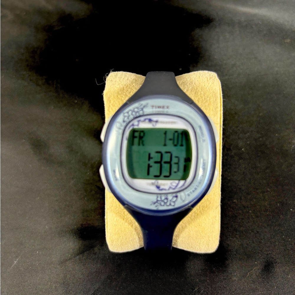 Women’s blue Timex Health Tracker
With large face Easy to read.35mm new w/batt